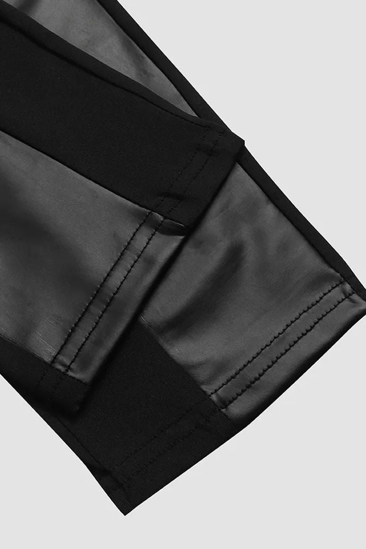 Pantalon en similicuir avec bordure contrastante et fermeture éclair