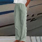 Pantalon rayé bleu confortable avec poches latérales