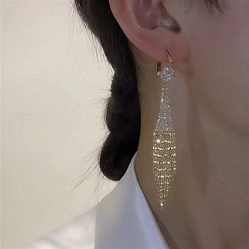 Boucles d'oreilles avec pattes en zircon