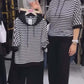 Ensemble pour femme composé d'un haut rayé et d'un pantalon uni