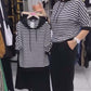 Ensemble pour femme composé d'un haut rayé et d'un pantalon uni