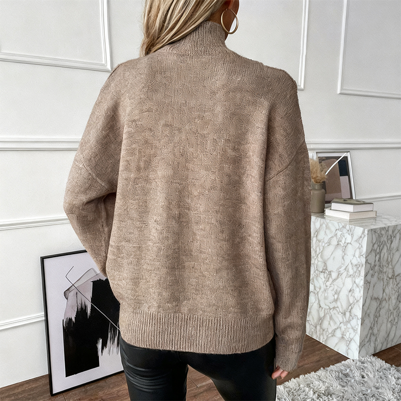 Pull féminin audacieux en laine, à col montant et épaules dénudées